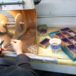 Michael Michaud polishing jewelry