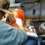 Michael Michaud polishing jewelry